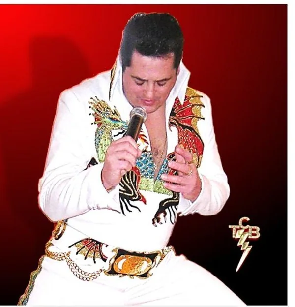 Elvis tribute act Trevor Dodson in a white jumpsuit