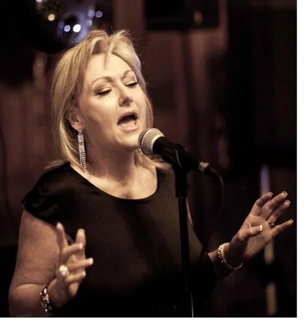 The Ultimate Divas singer Karen Bizzell performing